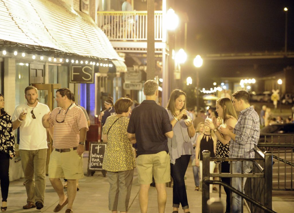 people enjoying the night life in downtown opelika