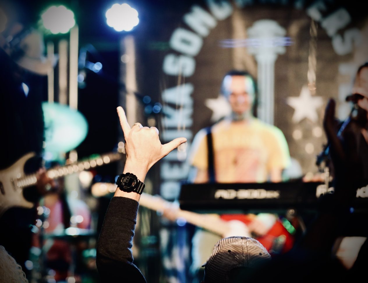 a crowd enjoying the band at the Opelika Songwriters festival