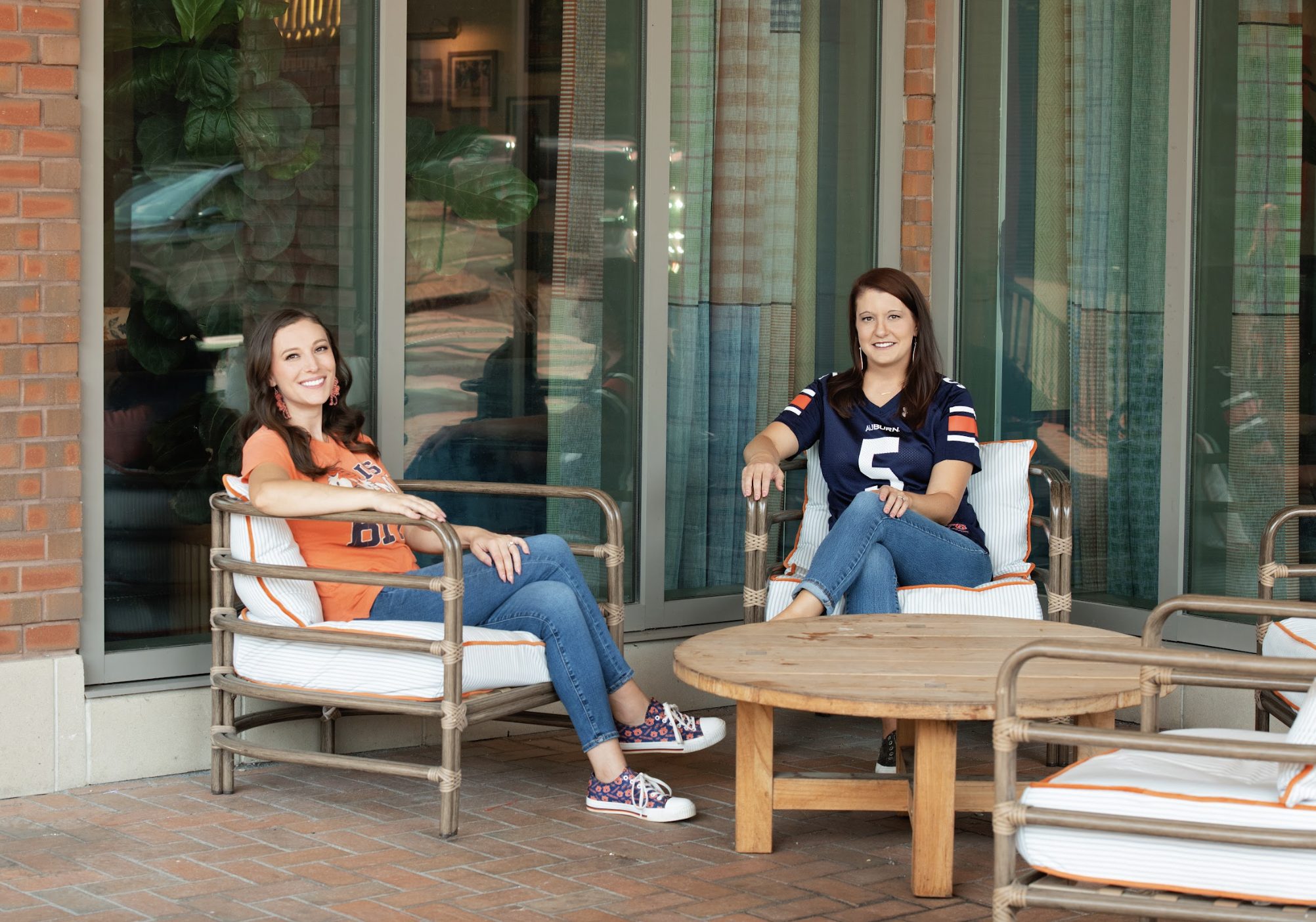 Kent McCown Group real estate team members sitting on condo patio in Auburn Alabama