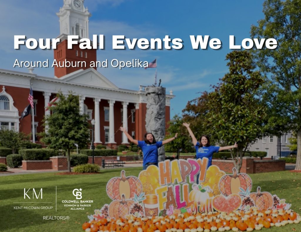 Corrie and Megan pose behind a colorful fall pumpkin display in front of the Lee County Courthouse in downtown Opelika.